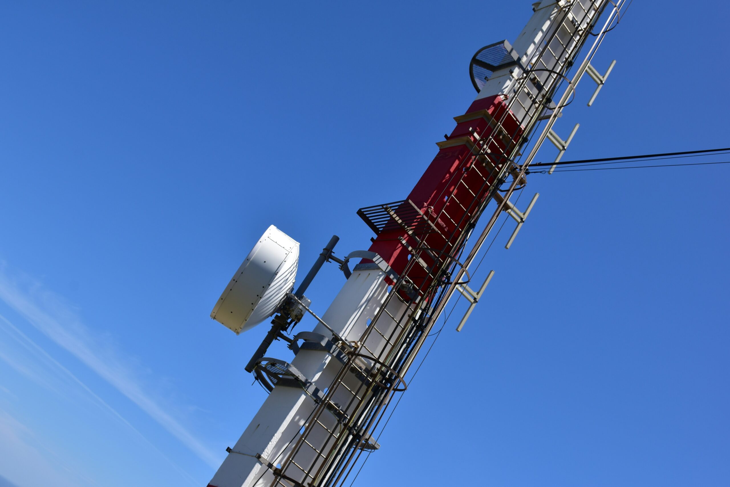 A tower with a radio antenna on top of it.